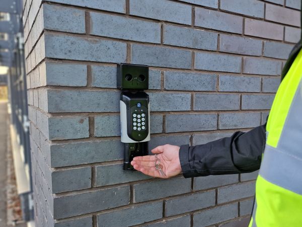 A security patrol guard retrieving keys from the SentriGuard key management system