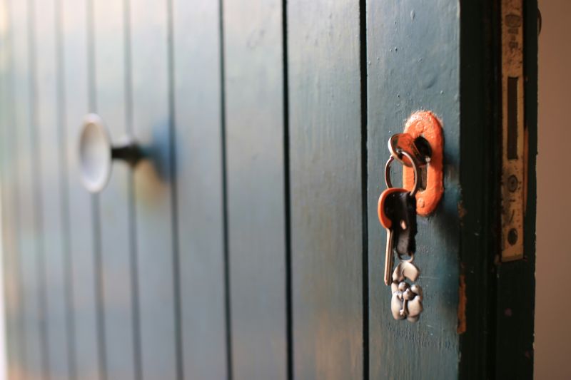 Property access with a key in a door lock