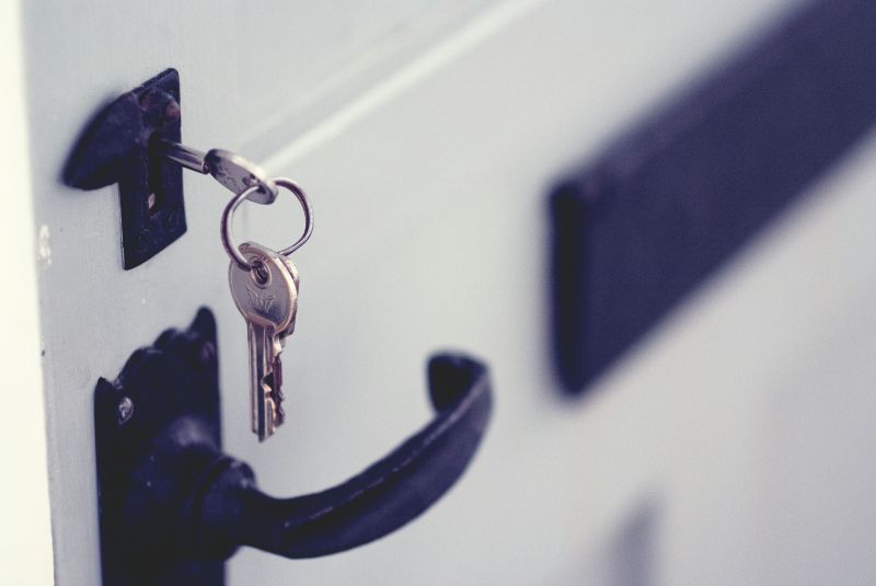 A key in a white door